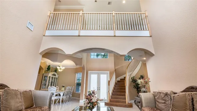 a view of livingroom with furniture and windows