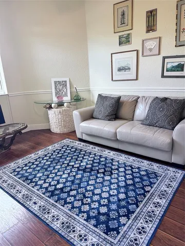 a living room with a couch and a coffee table
