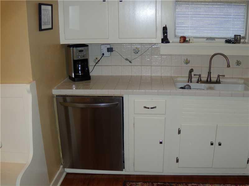 455 Beverly Road Mt. Lebanon, PA 15216 - Photo 10 of 24 Kitchen. KITCHEN AREA WITH EXAMPLES OF METICULOUS CABINET WORK AND TILE COUNTERS
