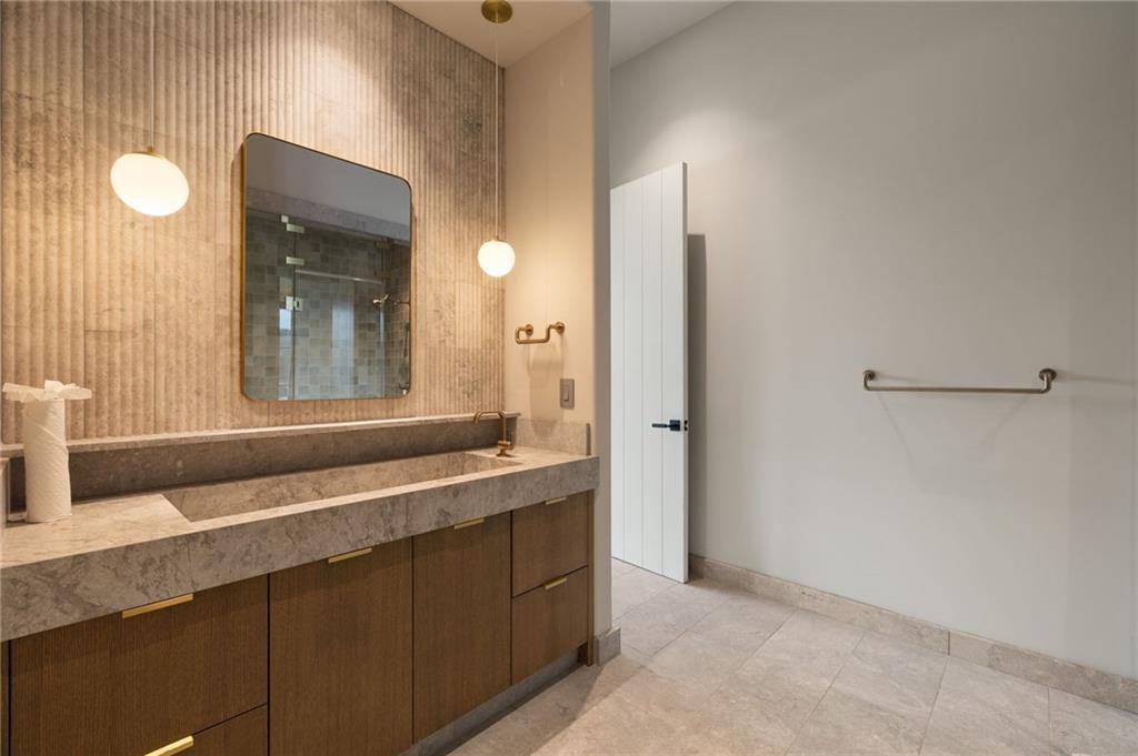 725 Rocky Point Drive Morganton, GA 30560 - Photo 107 of 157 a bathroom with a granite countertop sink and a mirror