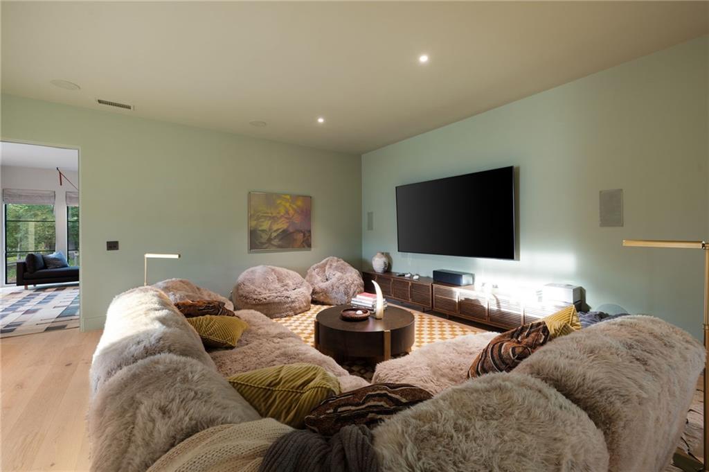 725 Rocky Point Drive Morganton, GA 30560 - Photo 114 of 157 a living room with furniture and a flat screen tv