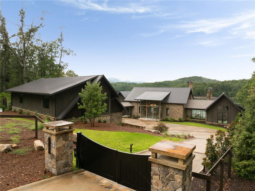 725 Rocky Point Drive Morganton, GA 30560 - Photo 21 of 157 an aerial view of a house with swimming pool and a yard