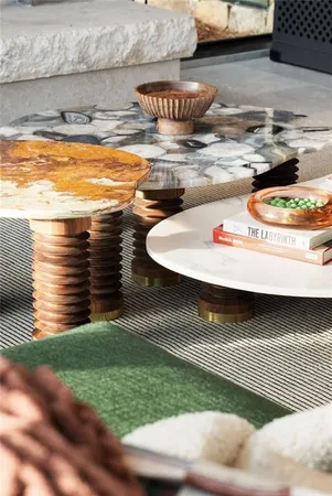 a bathroom with a granite countertop sink mirror vanity and toilet