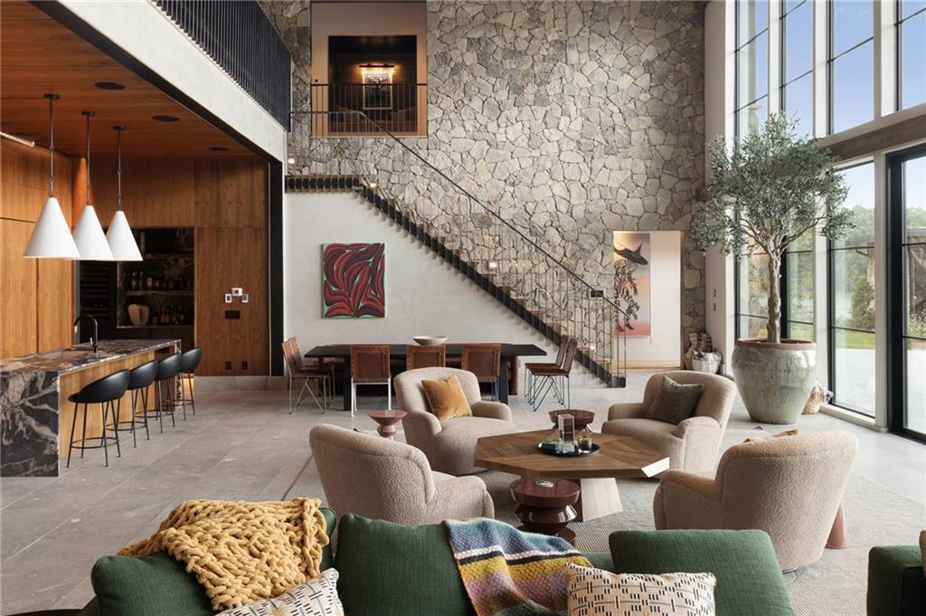 725 Rocky Point Drive Morganton, GA 30560 - Photo 41 of 157 a living room with furniture and a flat screen tv