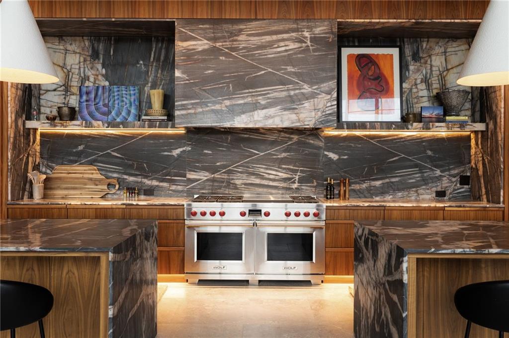 725 Rocky Point Drive Morganton, GA 30560 - Photo 48 of 157 a stove top oven sitting inside of a kitchen