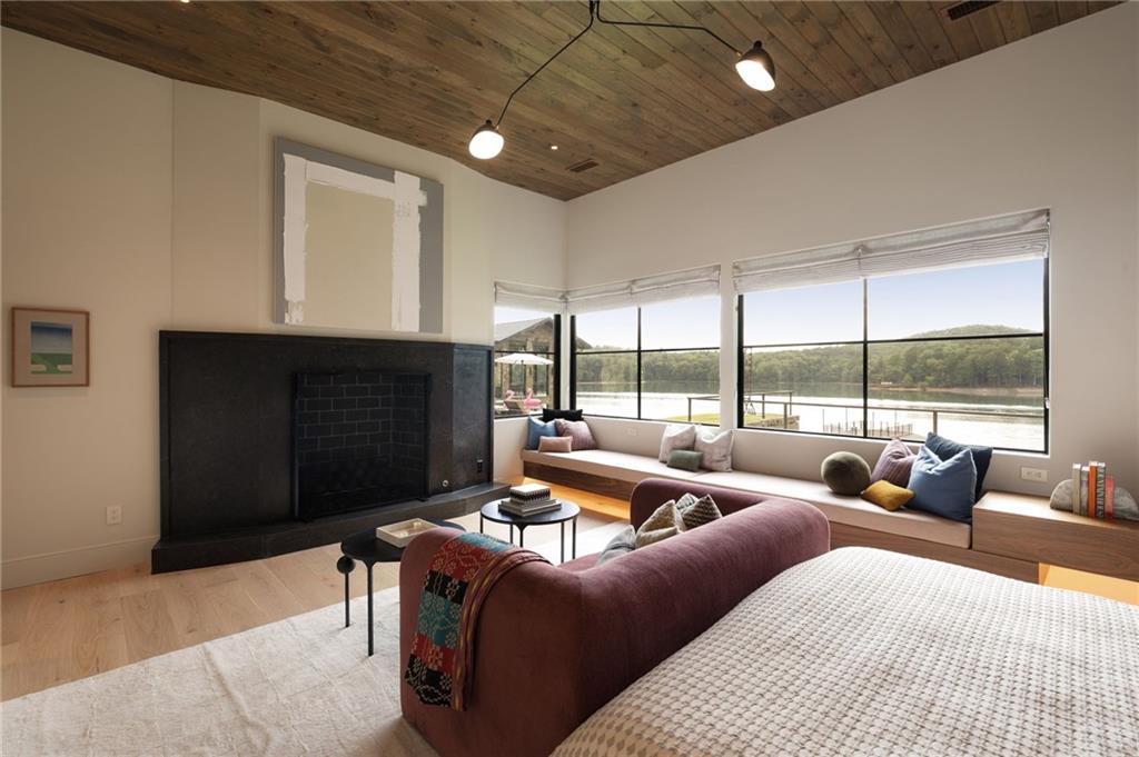 725 Rocky Point Drive Morganton, GA 30560 - Photo 70 of 157 a living room with furniture and a fireplace
