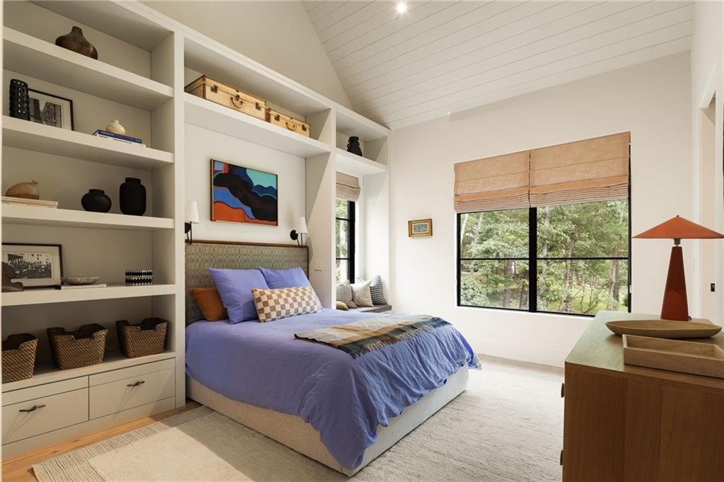 725 Rocky Point Drive Morganton, GA 30560 - Photo 92 of 157 a bedroom with a large bed and a window