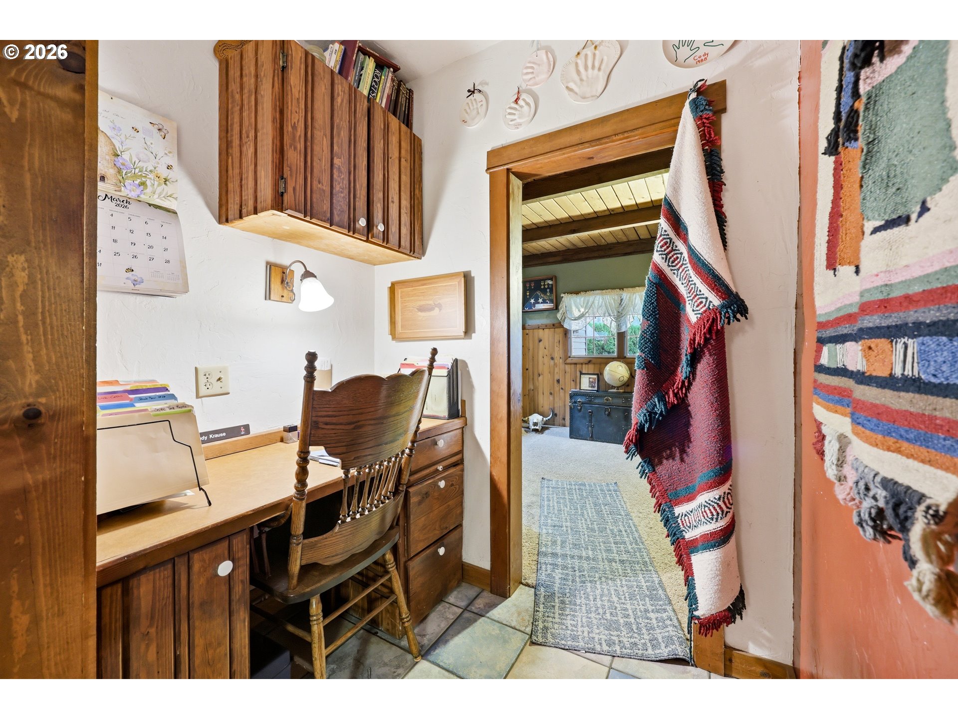 4209 P Street Washougal, WA 98671 - Photo 14 of 38 a workspace with furniture and a book shelf