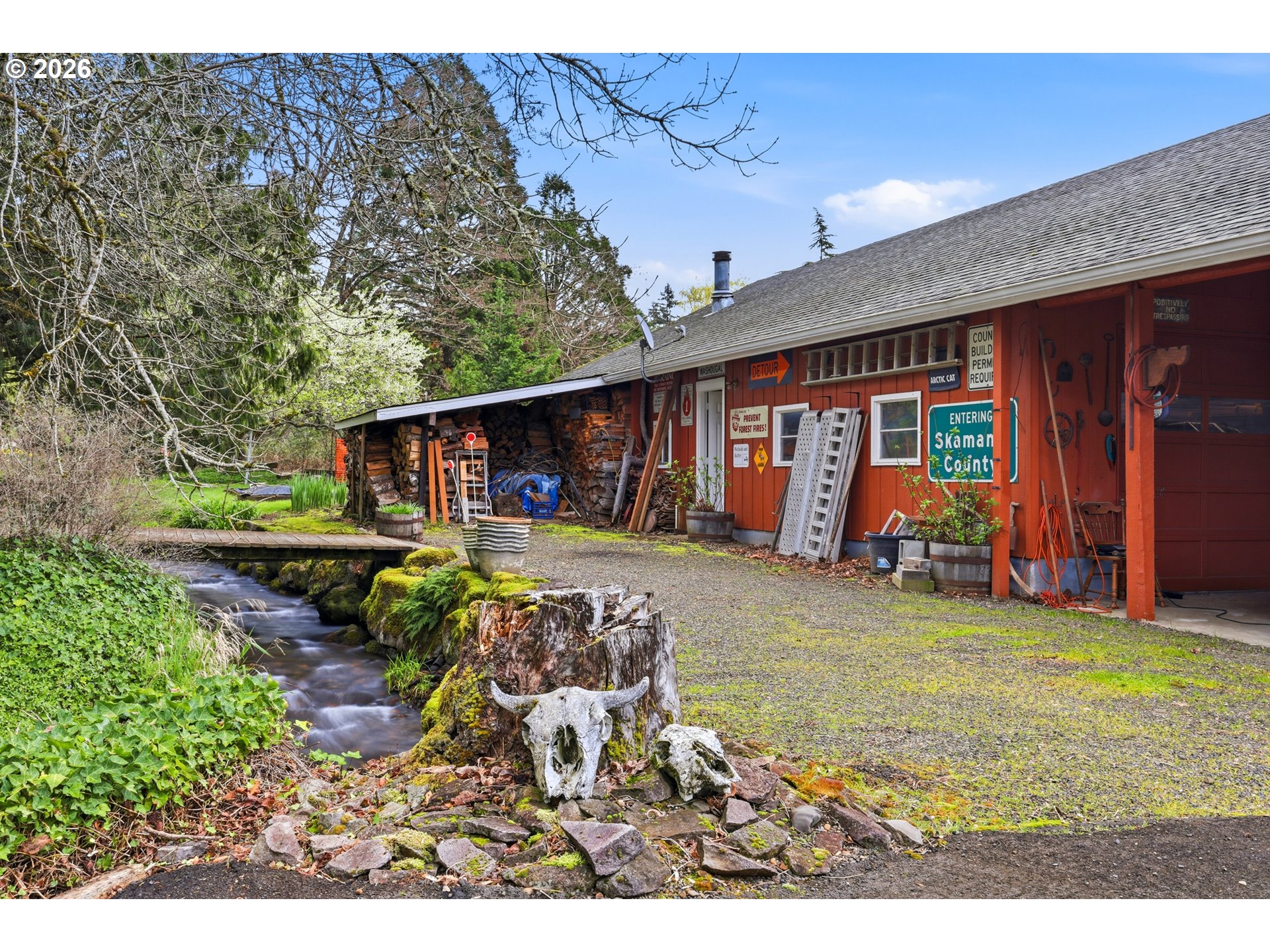 4209 P Street Washougal, WA 98671 - Photo 25 of 38 a view of a house with backyard porch and furniture