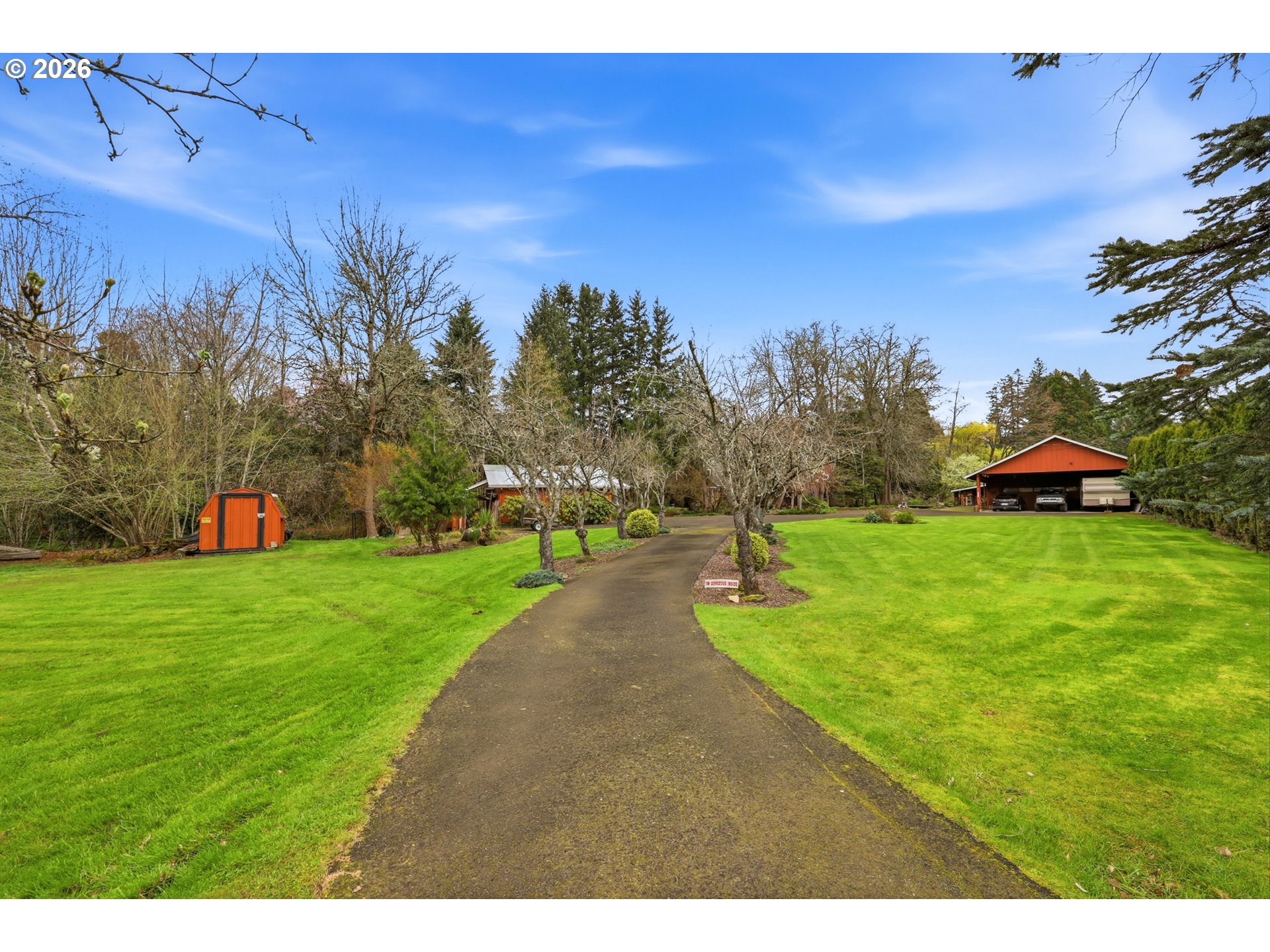 4209 P Street Washougal, WA 98671 - Photo 3 of 38 a view of a park with large trees
