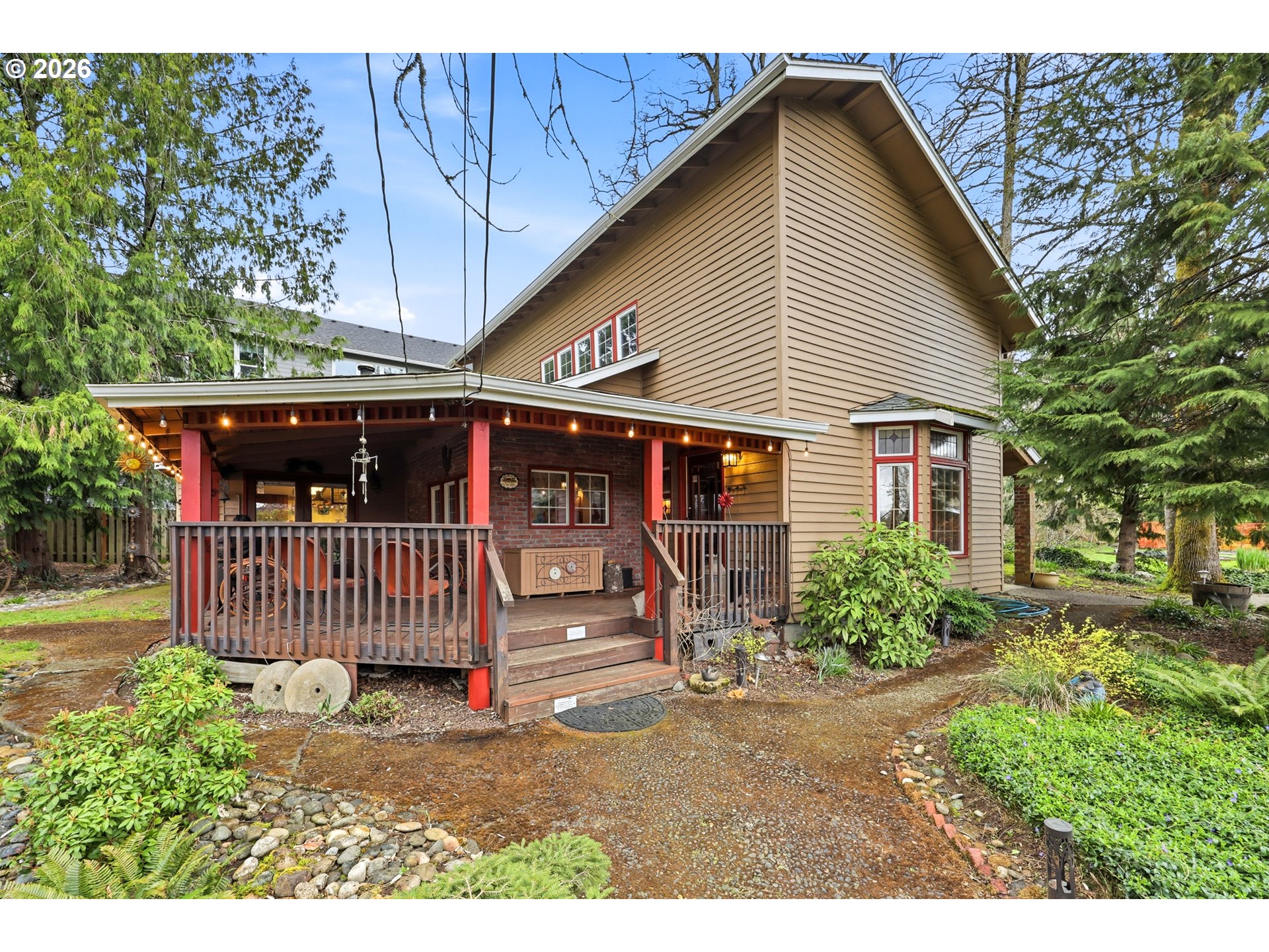 4209 P Street Washougal, WA 98671 - Photo 5 of 38 a view of a house with a yard and sitting area