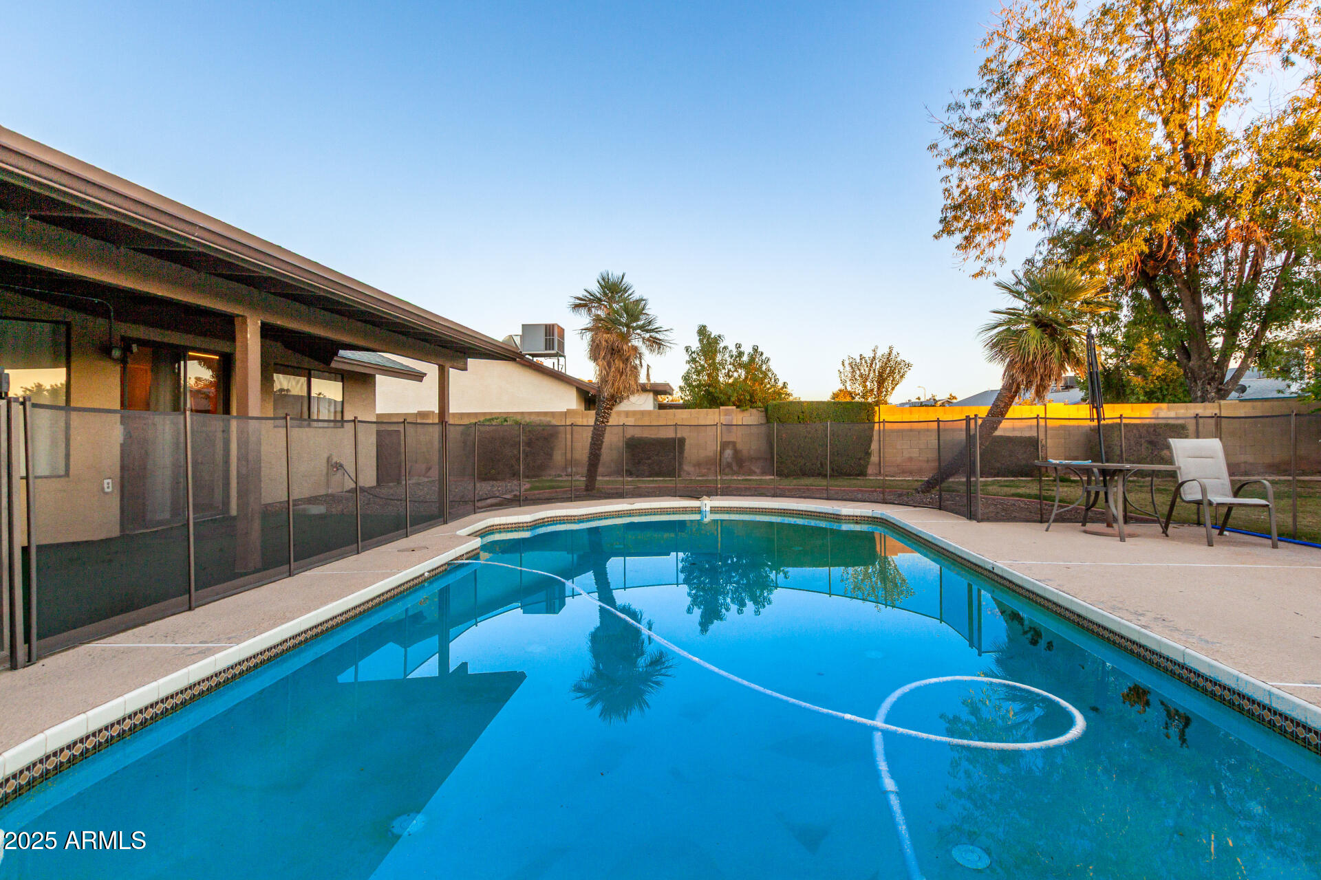 1729 West Brooks Street Chandler, AZ 85224 - Photo 30 of 33 a view of a swimming pool with a patio