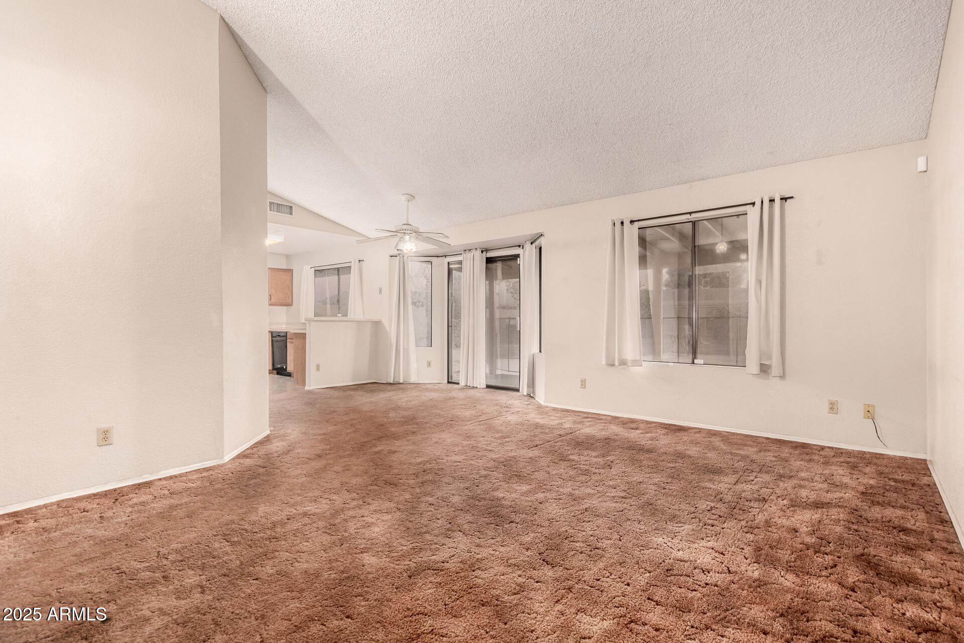 1729 West Brooks Street Chandler, AZ 85224 - Photo 9 of 33 a view of an empty room with a window