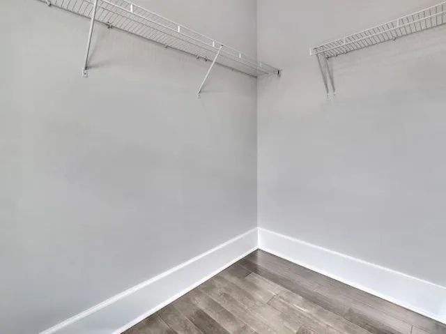 a view of a room with racks on the wall