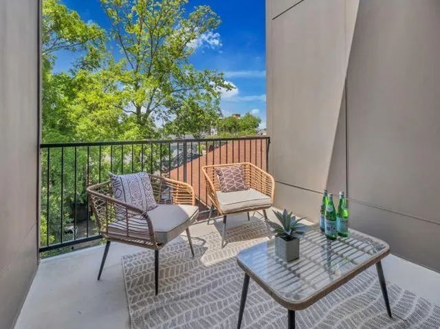 a view of a livingroom with furniture