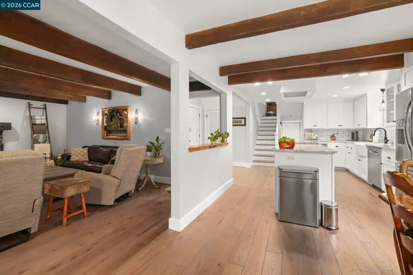 a view of kitchen with livingroom and furniture