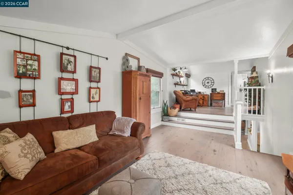a living room with furniture and a couch