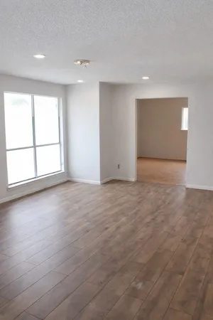 an empty room with windows