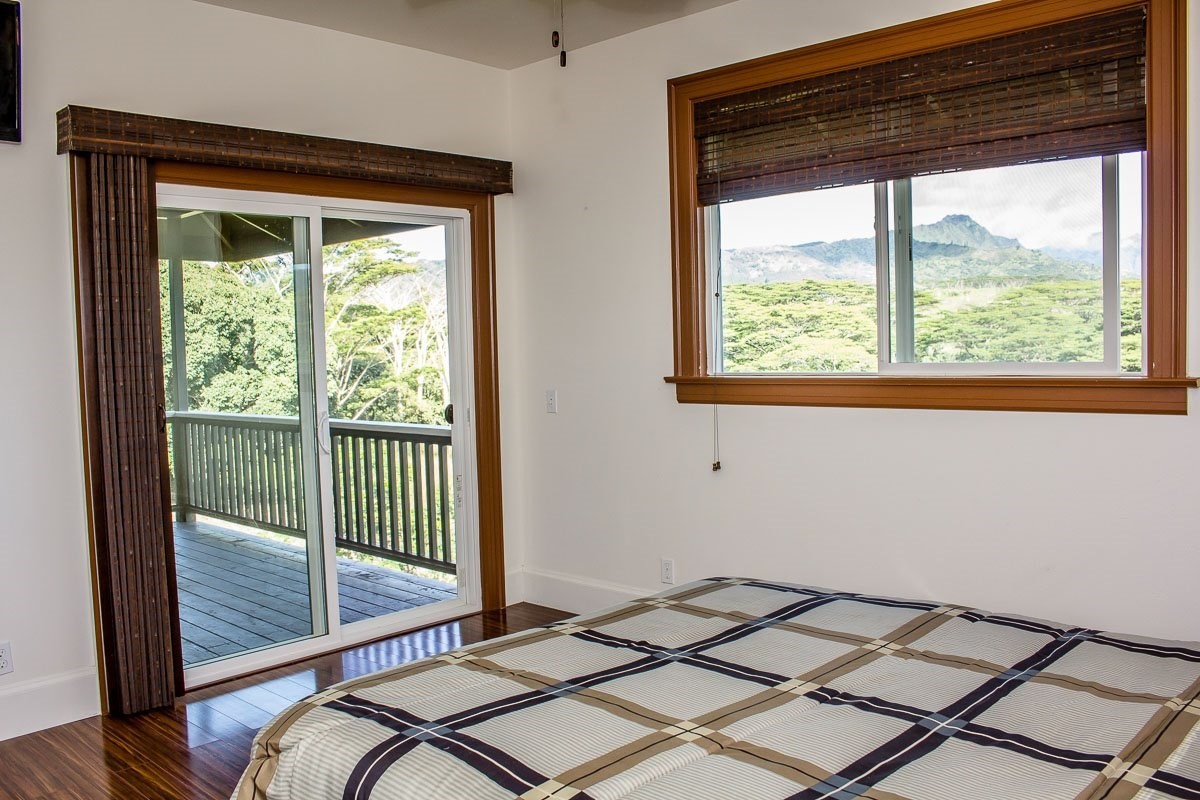 3746 Omao Road Koloa, HI 96756 - Photo 14 of 25 a view of a room that has a bed and a window