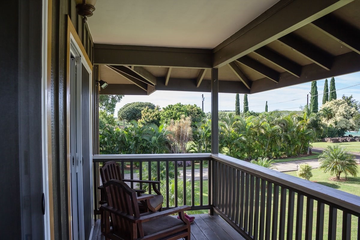 3746 Omao Road Koloa, HI 96756 - Photo 18 of 25 a view of a chair and table in the balcony
