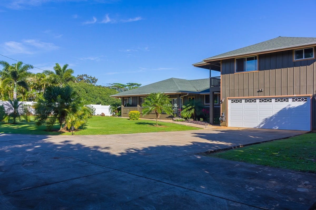 3746 Omao Road Koloa, HI 96756 - Photo 3 of 25 a view of a house with a yard