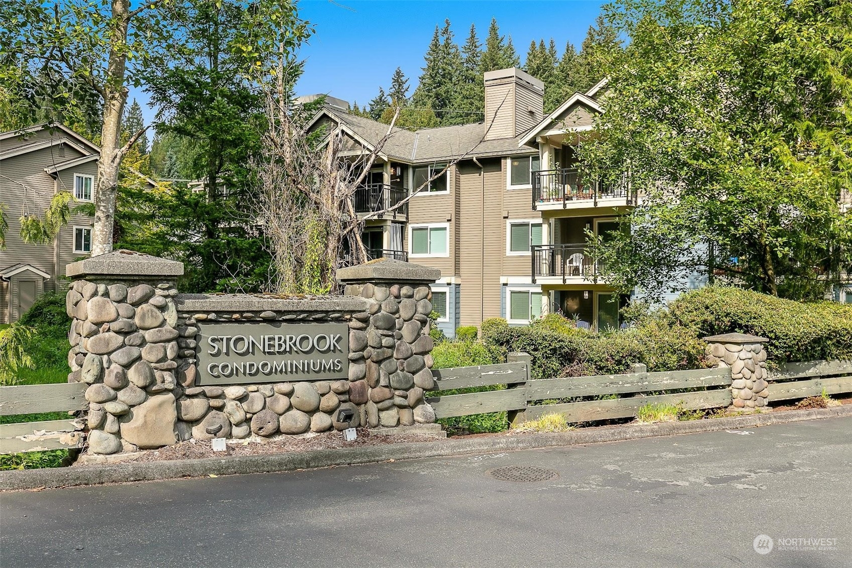 19404 Bothell Way Northeast, Unit B303 Bothell, WA 98011 - Photo 1 of 27 front view of a house with a street