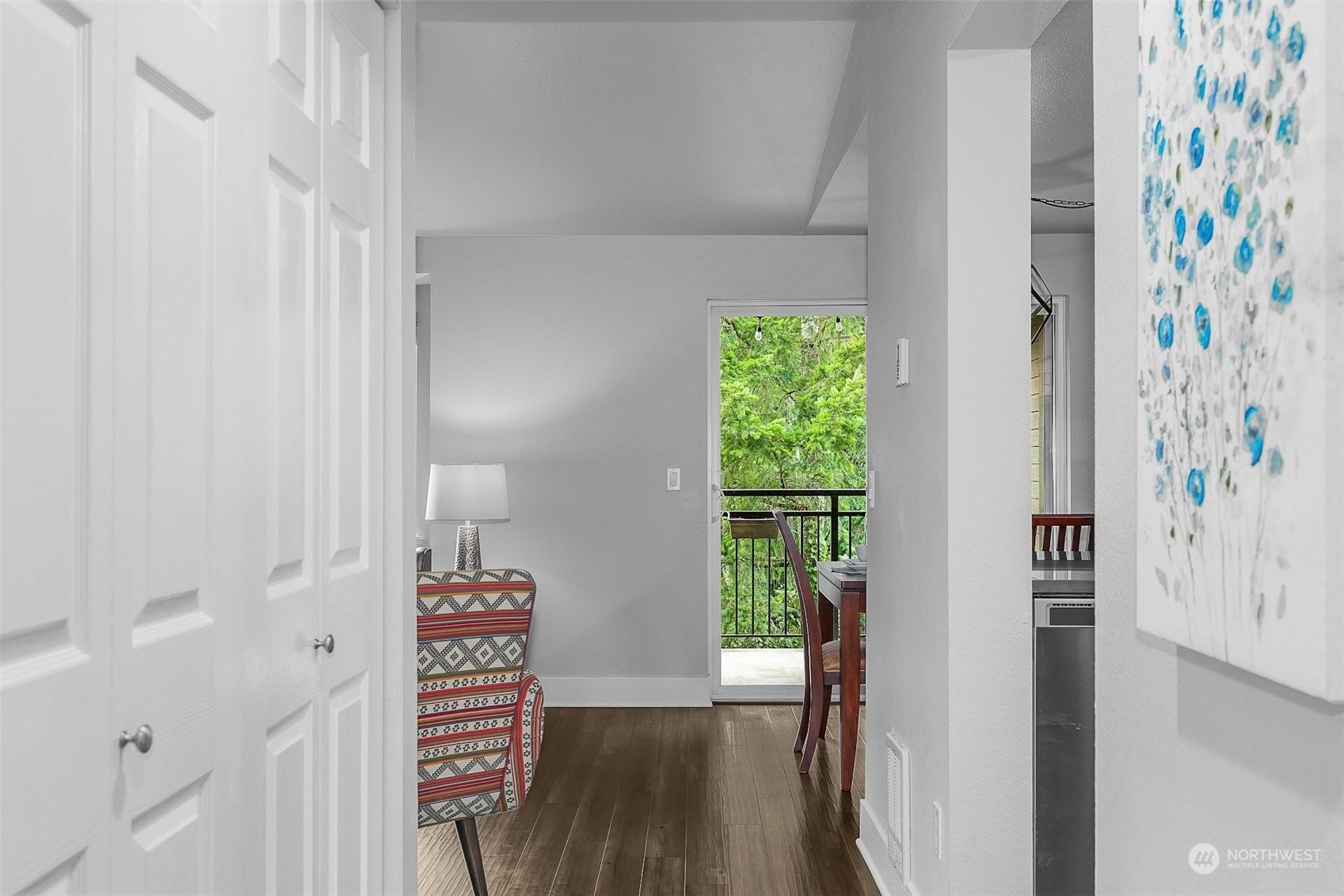 19404 Bothell Way Northeast, Unit B303 Bothell, WA 98011 - Photo 17 of 27 a view of a hallway with wooden floor and entryway