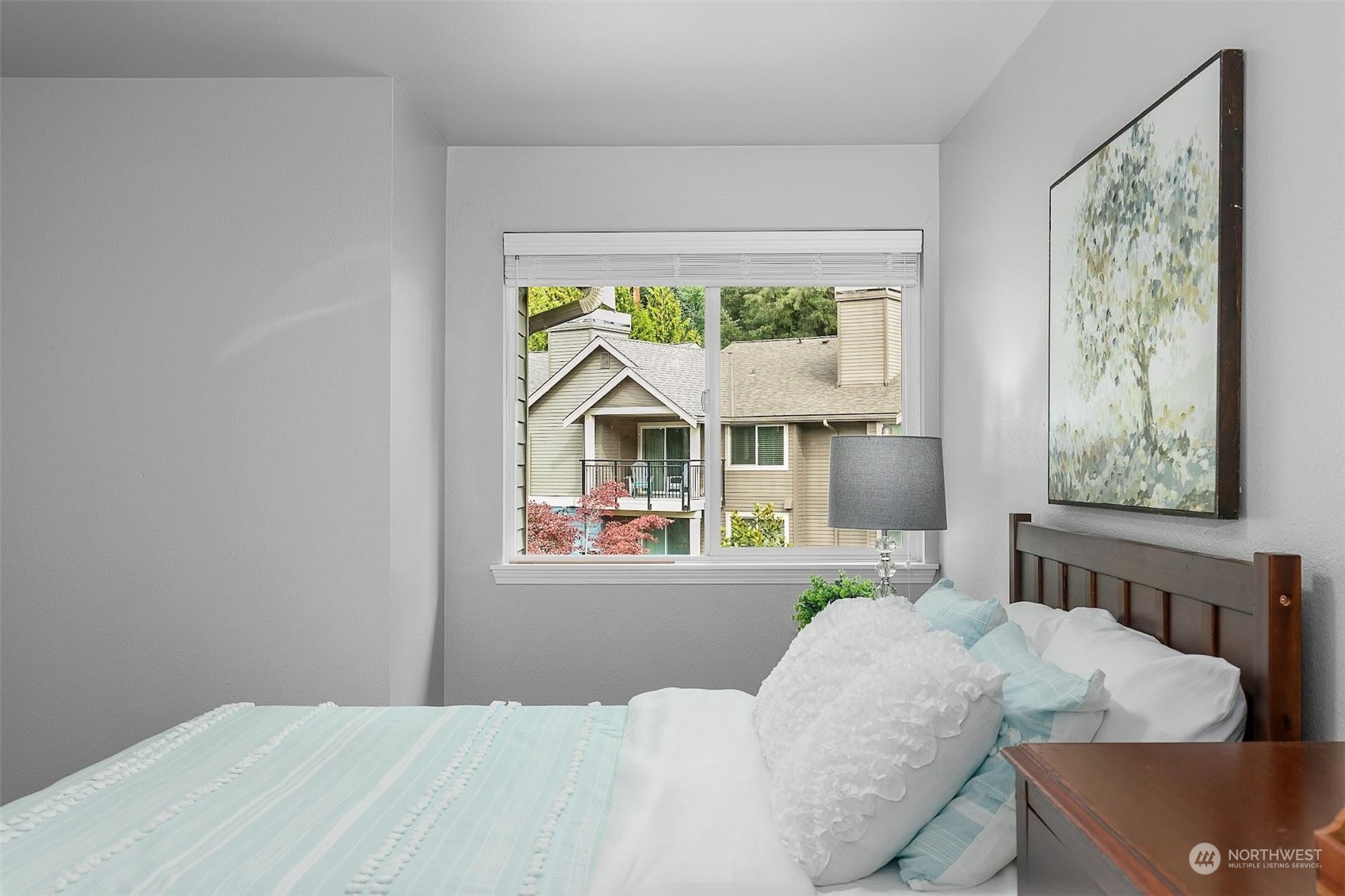 19404 Bothell Way Northeast, Unit B303 Bothell, WA 98011 - Photo 21 of 27 a bedroom with a bed and a window