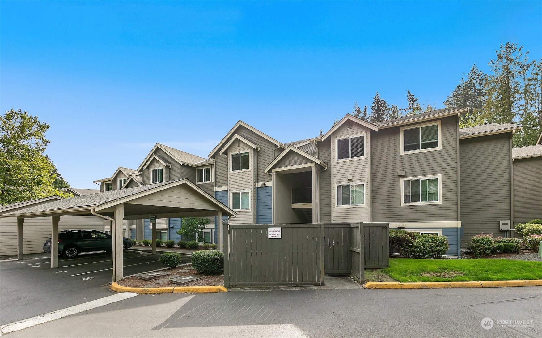 19404 Bothell Way Northeast, Unit B303 Bothell, WA 98011 - Photo 27 of 27 a front view of a house with a yard