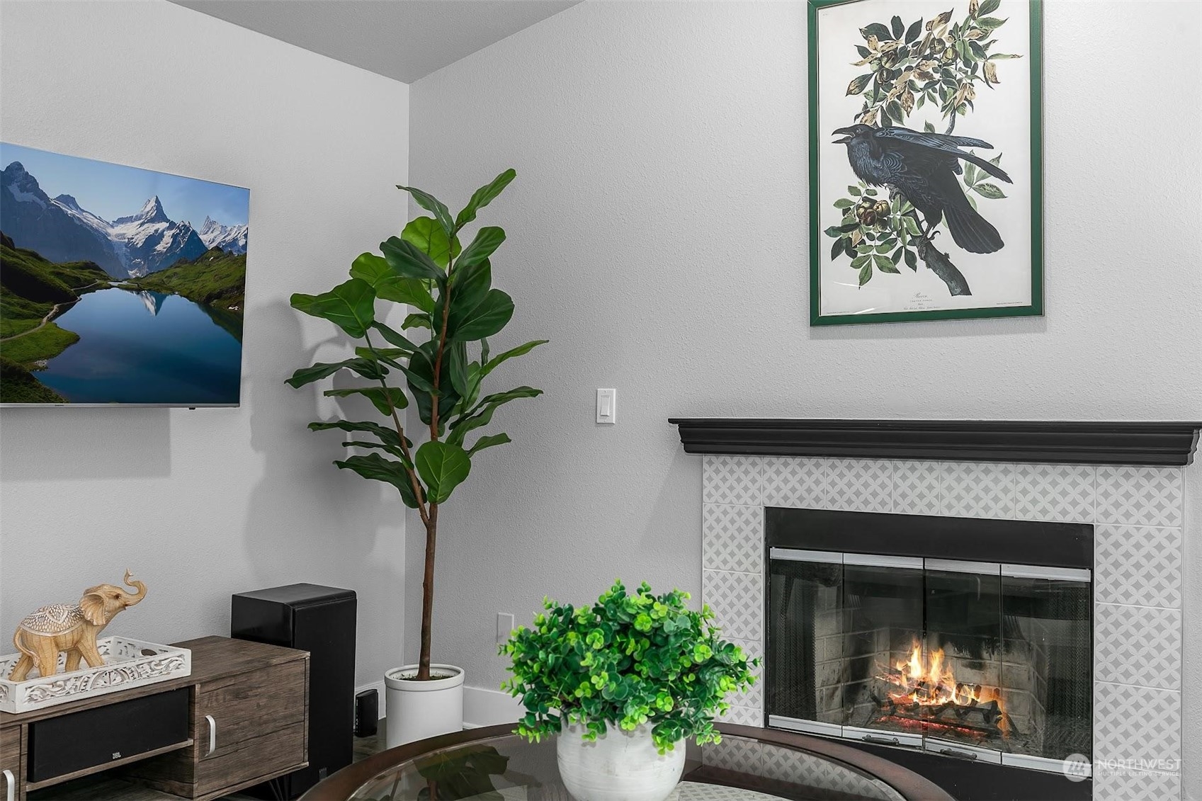 19404 Bothell Way Northeast, Unit B303 Bothell, WA 98011 - Photo 7 of 27 a living room with furniture and a fireplace