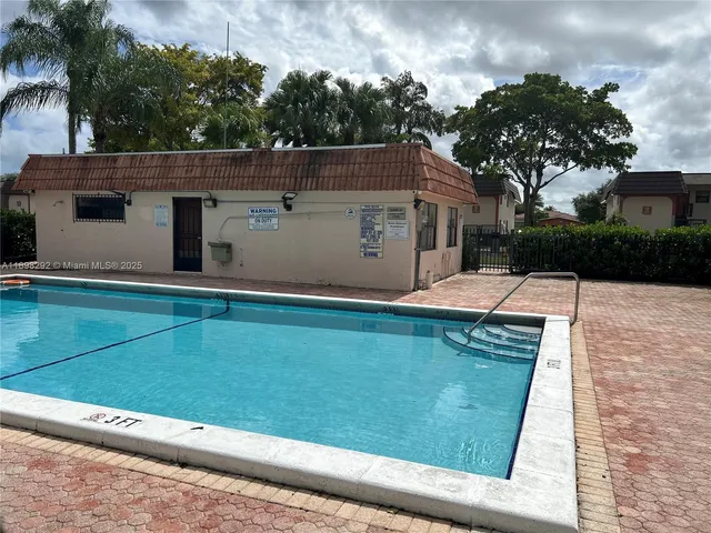 a view of a house with a small pool