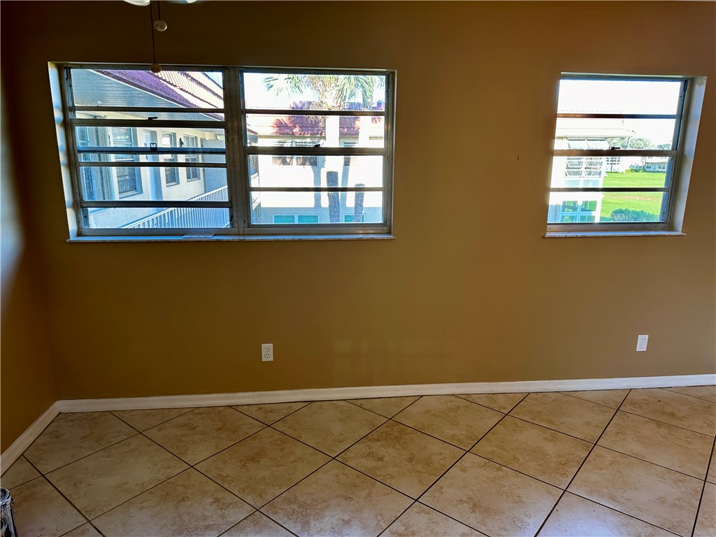 93 Spring Lake Drive, Unit 202 Vero Beach, FL 32962 - Photo 17 of 18 a view of a room with window