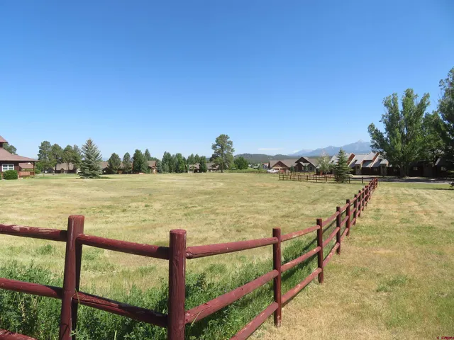 a view of a lake with a outdoor space