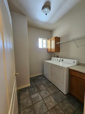 a bathroom with a sink toilet and tub