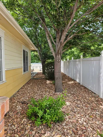 a backyard of a house with lots of green space