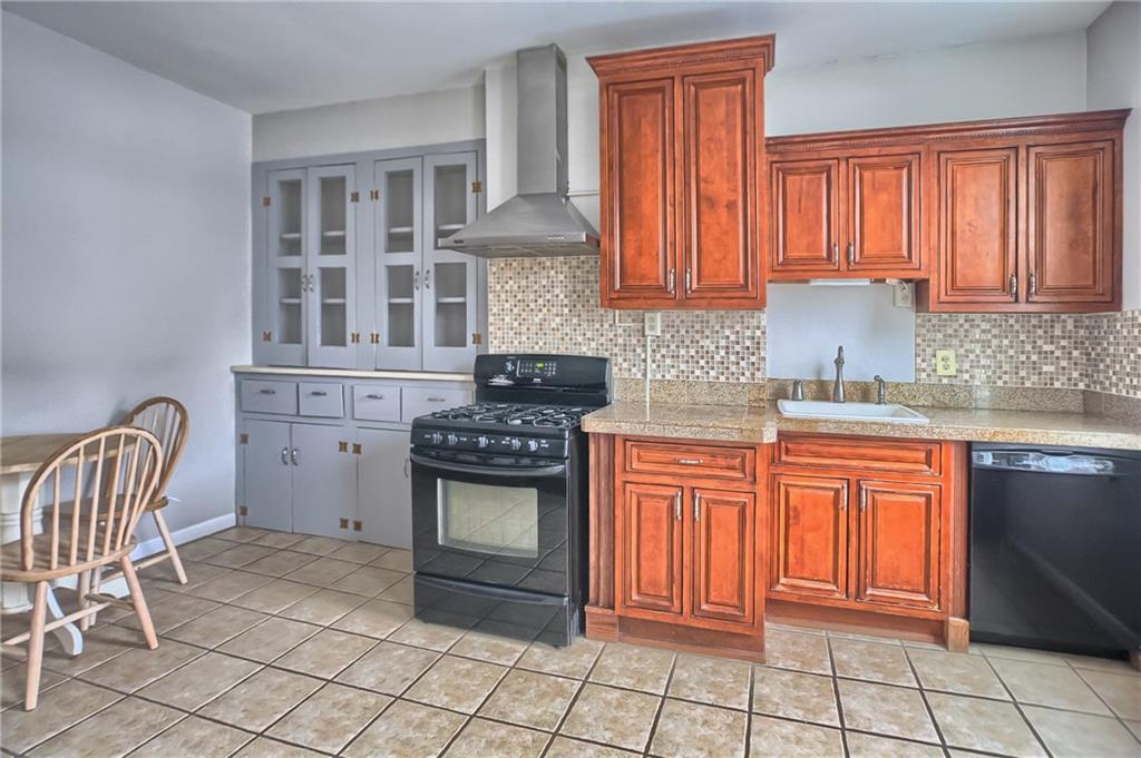 5151 Carnegie Street Pittsburgh, PA 15201 - Photo 6 of 16 The built in hutch is the perfect place for extra storage.