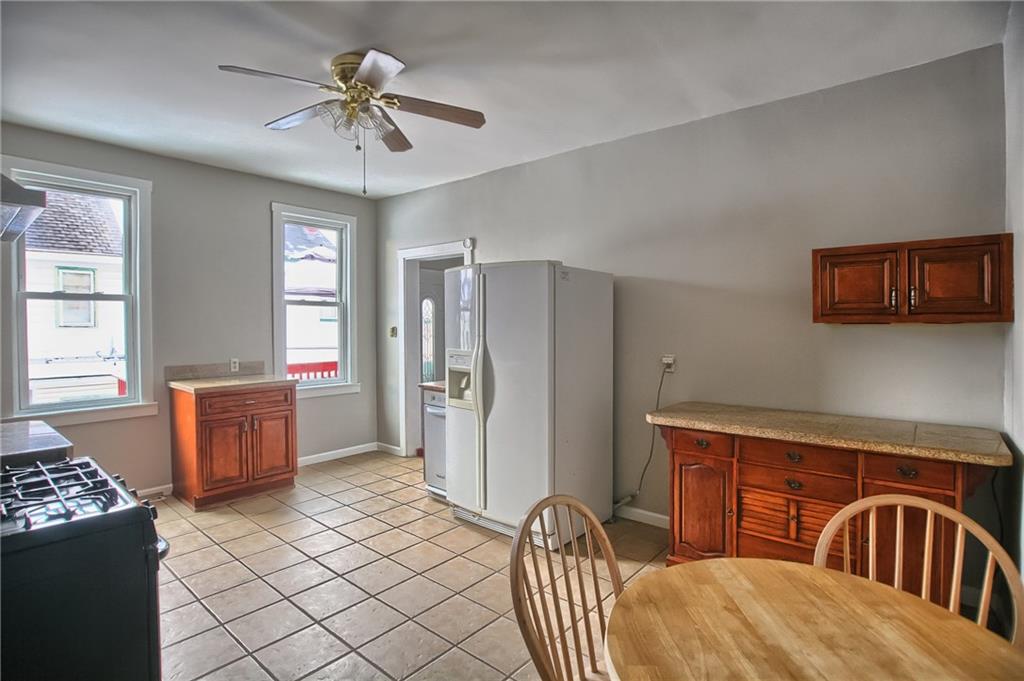 5151 Carnegie Street Pittsburgh, PA 15201 - Photo 7 of 16 The two large windows give ample light to the kitchen.