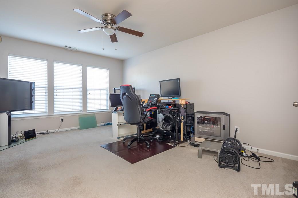 3315 Colorcott Street Raleigh, NC 27614 - Photo 13 of 21 a view of workspace with furniture and a window