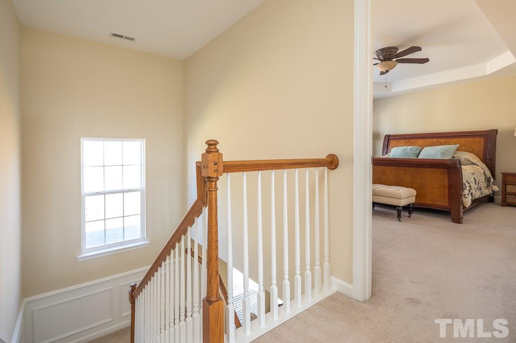 3315 Colorcott Street Raleigh, NC 27614 - Photo 15 of 21 a view of a bedroom with furniture and windows