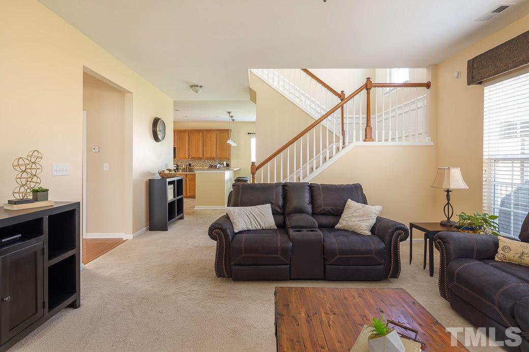 3315 Colorcott Street Raleigh, NC 27614 - Photo 7 of 21 a living room with furniture and a window