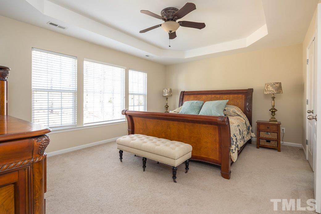 3315 Colorcott Street Raleigh, NC 27614 - Photo 9 of 21 a bedroom with a bed and a window