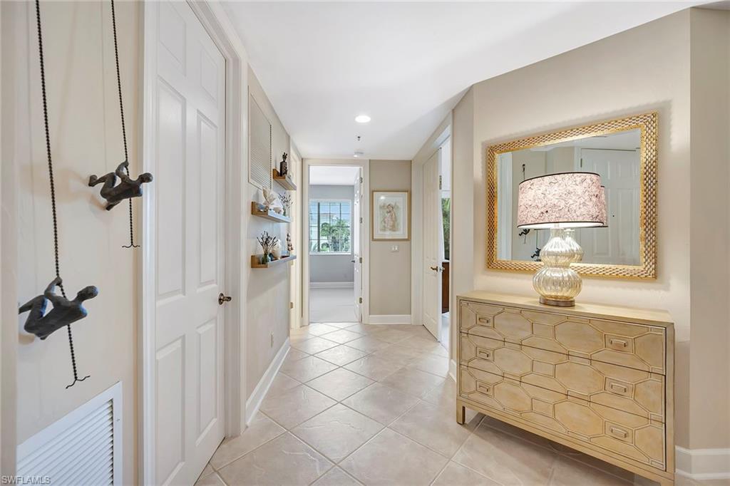 1004 5th Street South, Unit 502 Naples, FL 34102 - Photo 17 of 37 Foyer/laundry room on left
