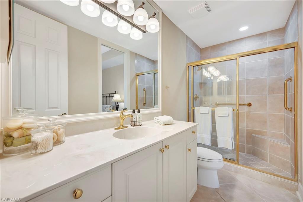 1004 5th Street South, Unit 502 Naples, FL 34102 - Photo 27 of 37 Bath adjacent to Queen Bedroom