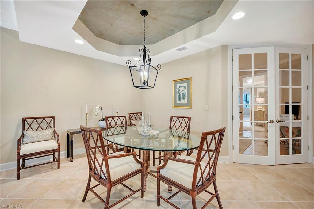 1004 5th Street South, Unit 502 Naples, FL 34102 - Photo 5 of 37 Dining Area and Doors to Den