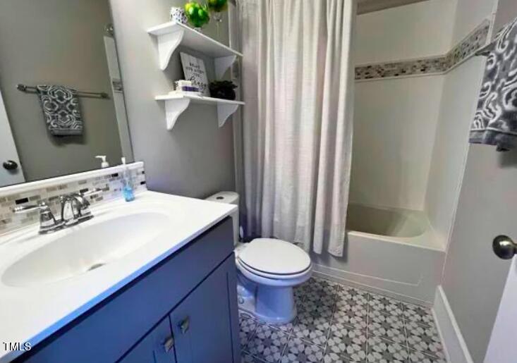 3015 Freeman Farm Way Rolesville, NC 27571 - Photo 20 of 50 a bathroom with a sink toilet and shower