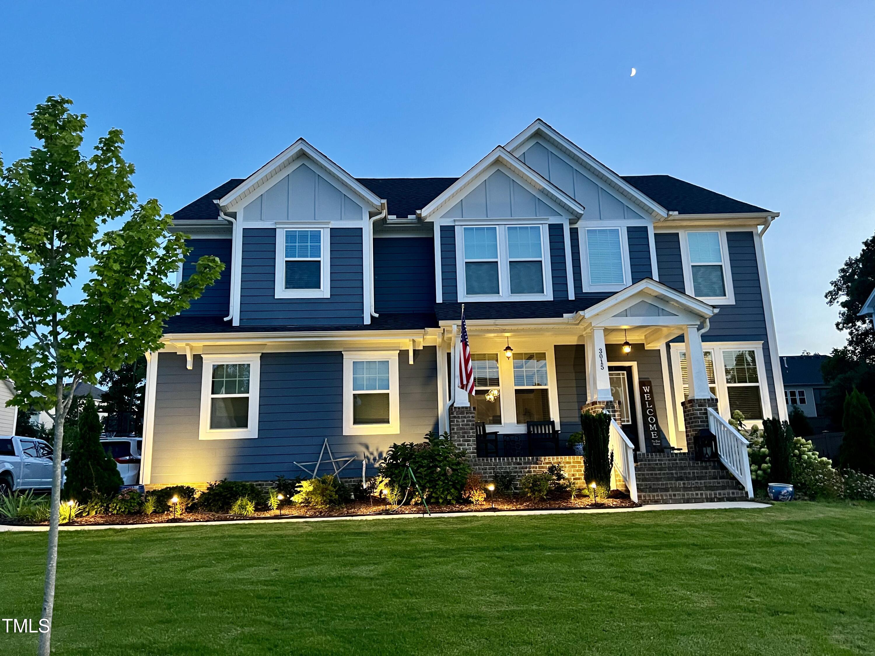 3015 Freeman Farm Way Rolesville, NC 27571 - Photo 2 of 50 a front view of a house with a yard