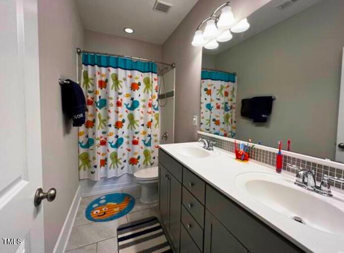 3015 Freeman Farm Way Rolesville, NC 27571 - Photo 35 of 50 a bathroom with a sink a vanity and a mirror