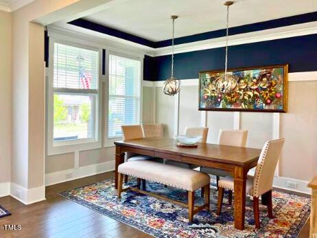 3015 Freeman Farm Way Rolesville, NC 27571 - Photo 6 of 50 a view of a dining room with furniture window and wooden floor