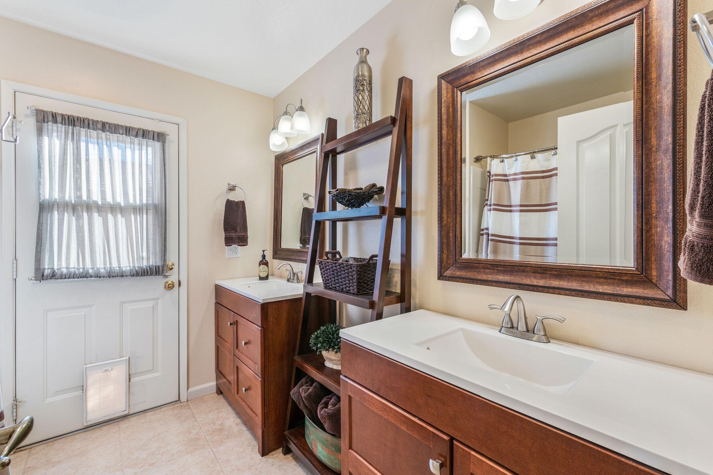 39795 Regency Way Palm Desert, CA 92211 - Photo 24 of 39 a bathroom with a sink and a mirror