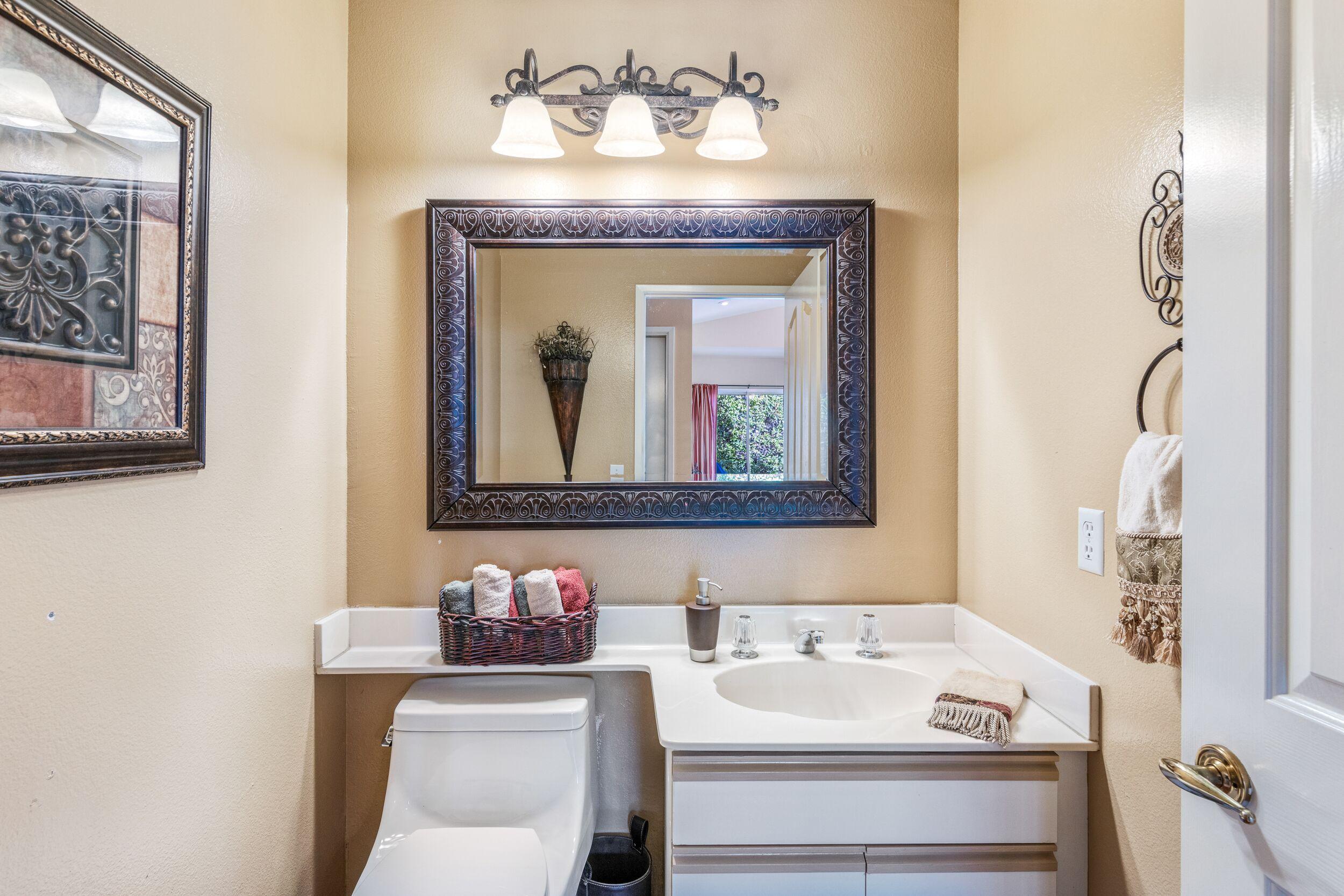 39795 Regency Way Palm Desert, CA 92211 - Photo 32 of 39 a bathroom with a sink and a mirror